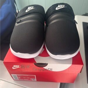 Nike womans Black and White Slippers